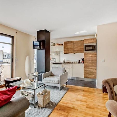 Appartement Des Toits - Welkeys Paris Bagian luar foto