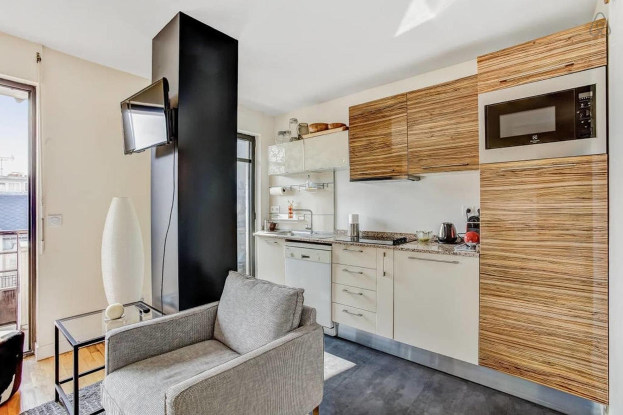 Appartement Des Toits - Welkeys Paris Bagian luar foto